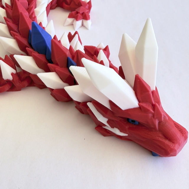 Crystal Dragon – Patriotic Red, White & Blue limited-edition Making this dragon an instant eye-catcher on any shelf, desk, or gaming table.