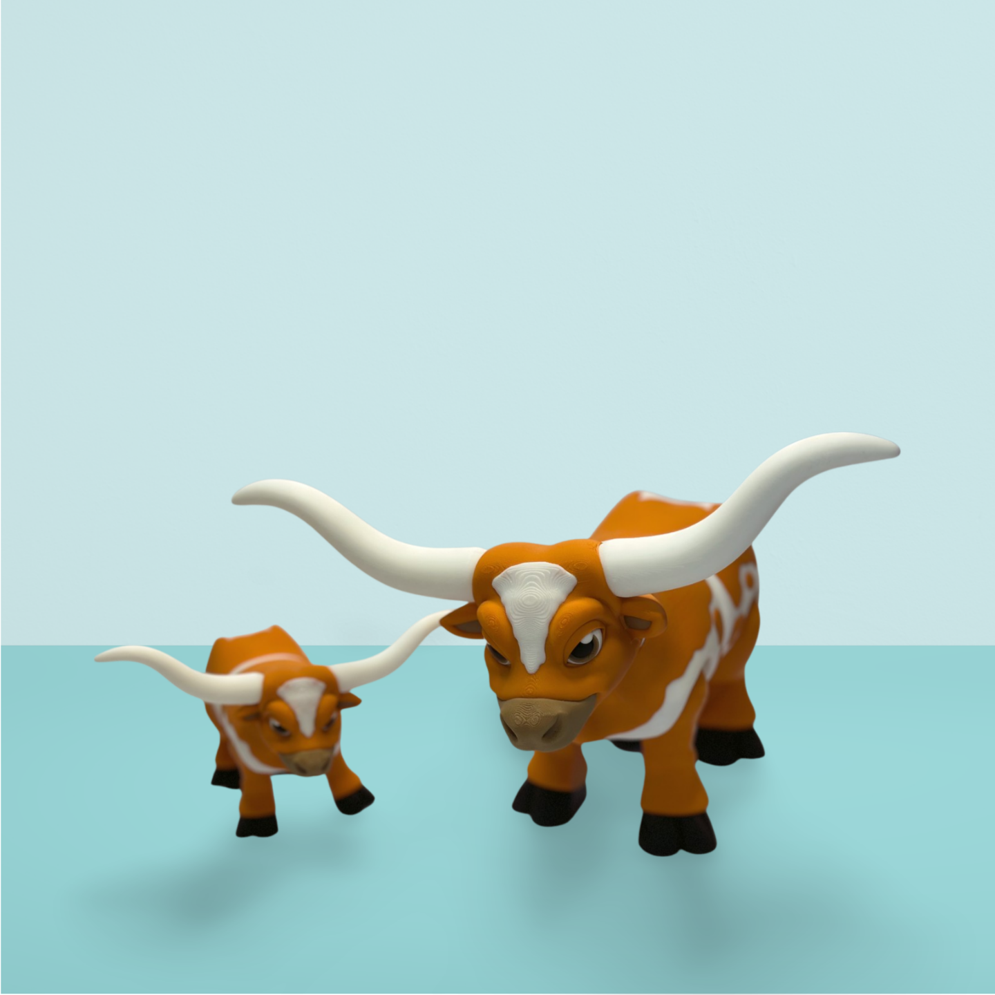 Cute articulated 3D printed Texas longhorn bull toy figure in burnt orange and white with big curved white horns